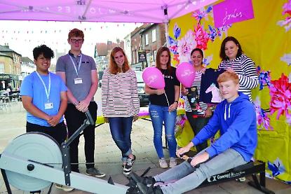 Shop staff row 13 miles in charity fund-raiser