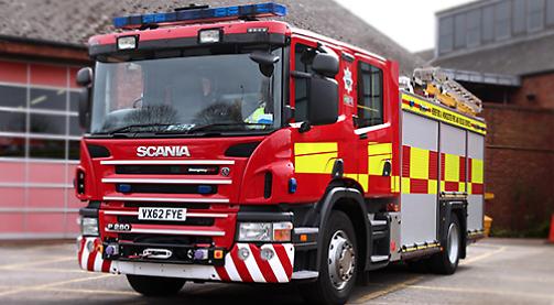 Firefighters rescue unconscious man trapped in car