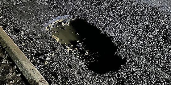 Council £50m pledge to fix potholed roads