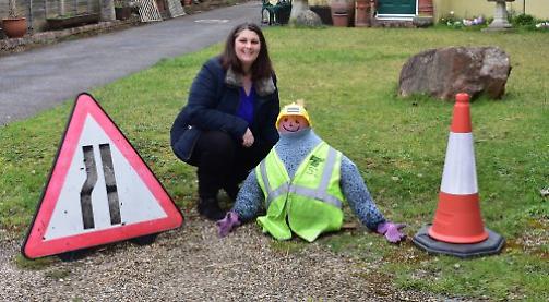 Families create scarecrow trail for school