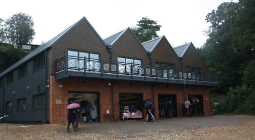 Ex-headmaster opens new boathouse with his name
