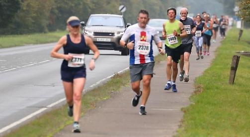 Half marathon returns on sunny Sunday but numbers are down