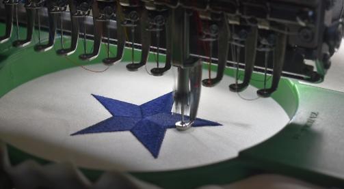Tailor opens first rowing blazer shop after move