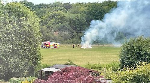 Arson suspected after hay bales are destroyed in fire