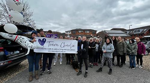 Walkers raise £2,600 in memory of brave Charlie