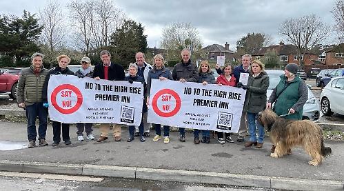 Residents stage protest against station hotel plan