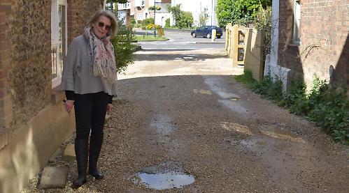 Potholed road outside my house is worst in Henley