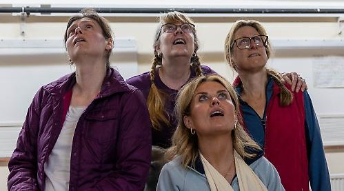 Four women on work trip stuck on island...