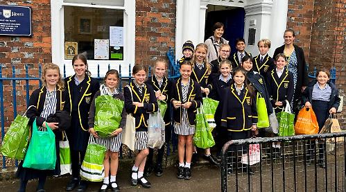 Pupils deliver donation bags to food bank