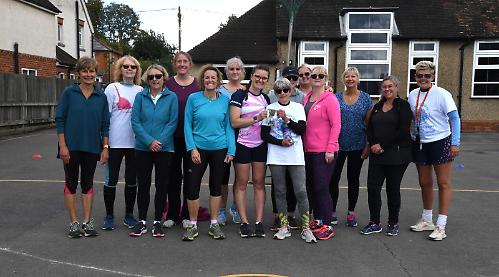Walking netball match raises £1,600 for cancer charity