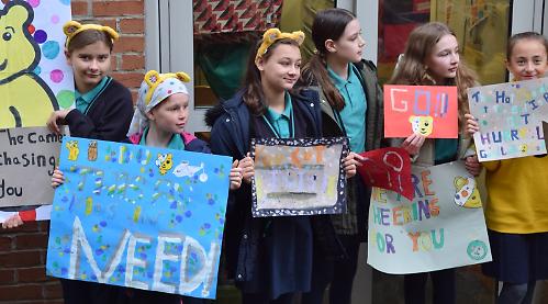 Pudsey dances and hugs children during school visit