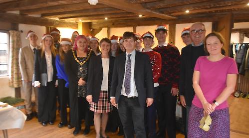 Almshouses residents on a high with Christmas lunch and singing by students