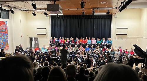 Band and community choir combine to present music from the stage