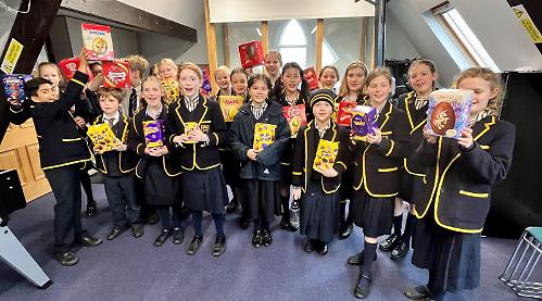Pupils give 185 Easter eggs to food bank
