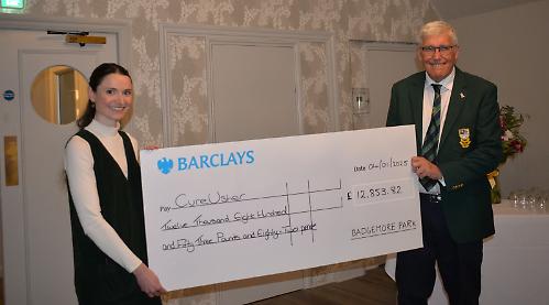 Golf club captain raises £12,000 for charity
