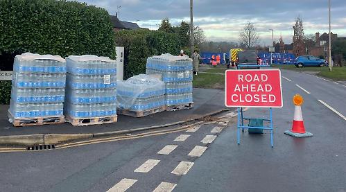 Burst water pipe causes road to collapse
