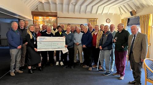 Golfers raise £5,800 for charity