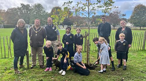 School plants two trees for 100th birthday