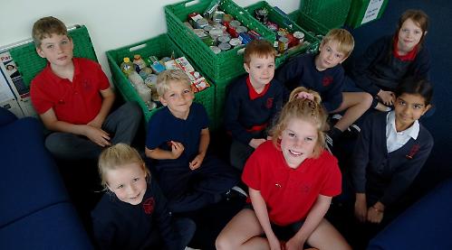 Children from Heights Primary School deliver supplies to foodbanks
