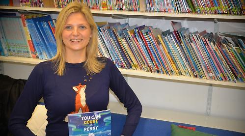 Financier writes children’s book with message to follow dreams