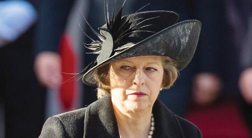PM pops back to Liz's shop for Cenotaph hat