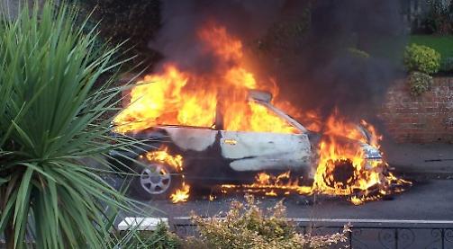 Car ablaze near closure-threatened fire station