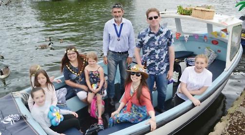 Record numbers take to the water for third floral flotilla