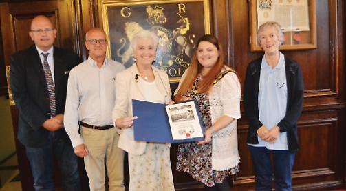 Decorative parchment celebrates twin towns