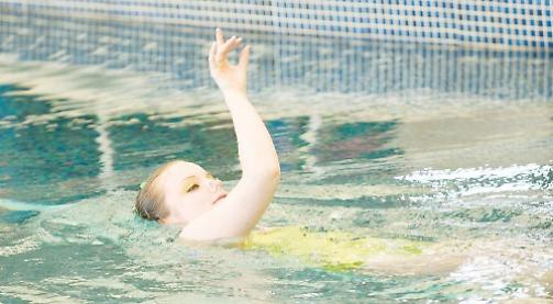Synchronised swimmer and sequinned costume maker