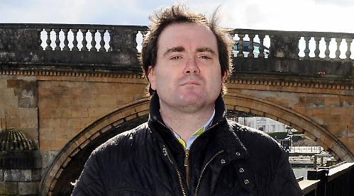 Shop worker axed for online posts
