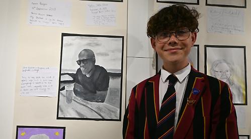 Boy paints portrait of late father for art exhibition
