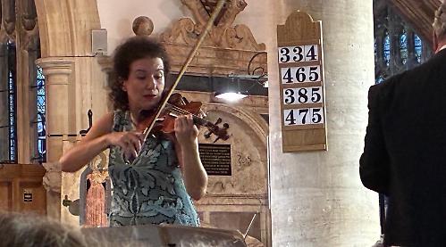 Violinist’s virtuosity and orchestral accompaniment has us gripped