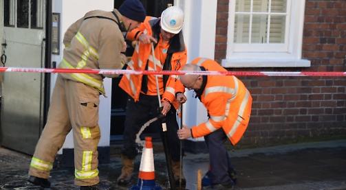 Couple's basement flooded & shops shut by water main burst
