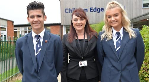 School to stay open after improving with new head
