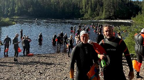 Pair complete Arctic river swim