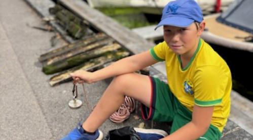 Boy, 11, fishes out litter from Thames