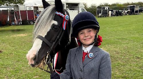 Birthday to remember for girl, nine, crowned show champion