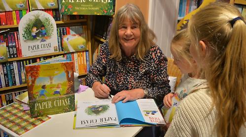 Children’s author drops in to shop to sign copies of latest book