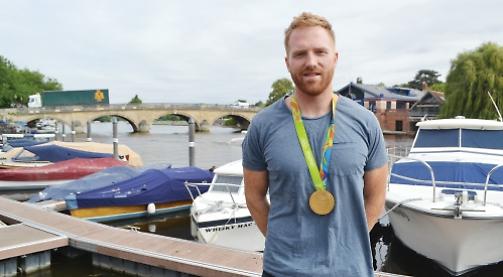 Rowing ace in heart scare