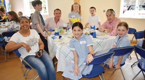 Pupils treat locals to tea party