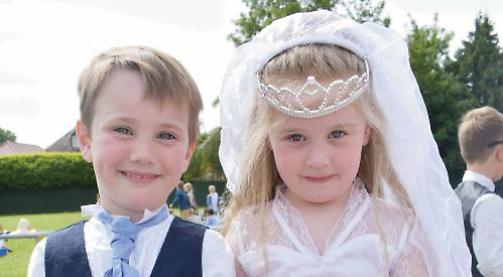 Pupils stage their own wedding ceremony