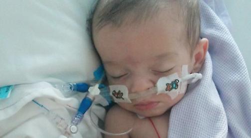 Mum runs for baby charity