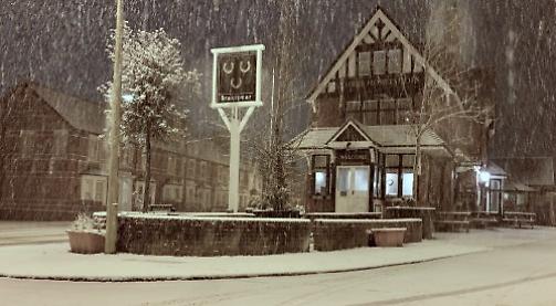 Snowfall causes travel disruption and shuts schools