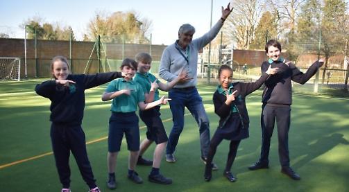 Dancing in the playground for Red Nose Day