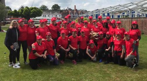 Mothers row 20 miles in dragon boat for school