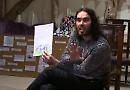 Russell Brand tells stories to Henley children
