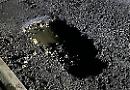 Council £50m pledge to fix potholed roads