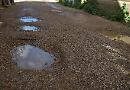 Potholed road outside my house is worst in Henley
