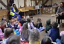 Brand gives reading to children during May Fayre