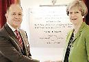 Mrs May takes time off to open church & community hall